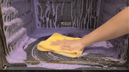Wipe oven inside